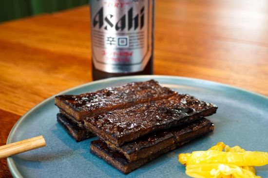 Picture of Jerky and 6pk Asahi